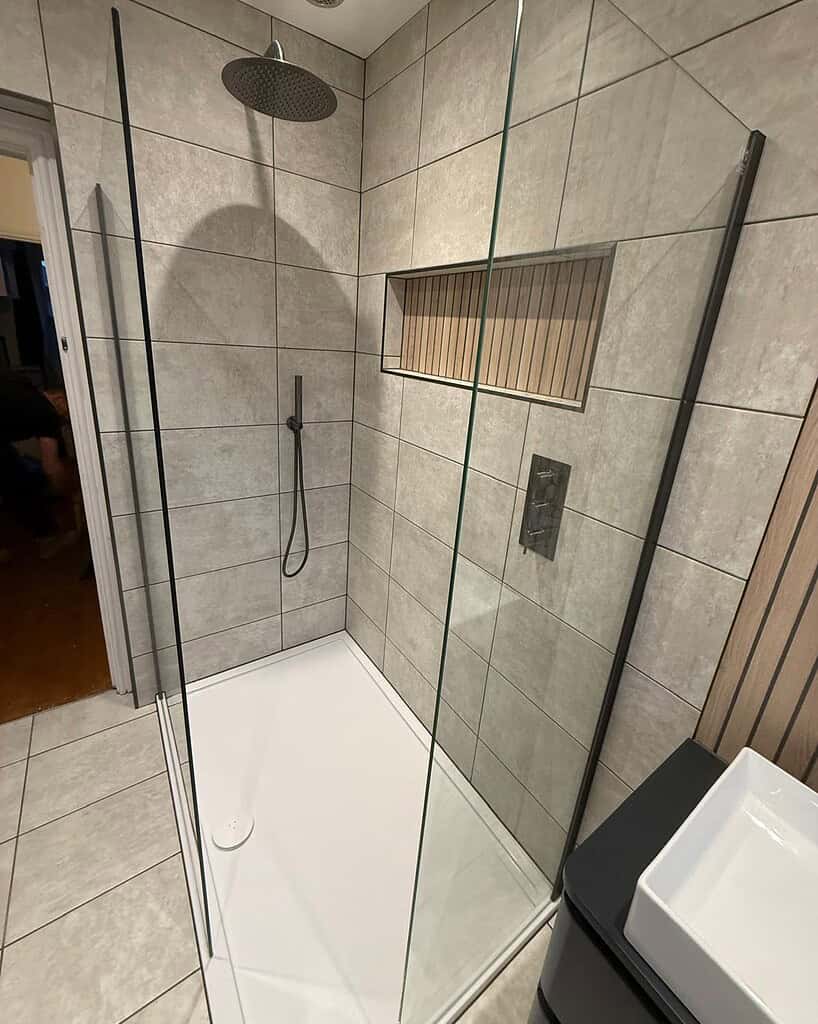 Stylish walk-in shower with glass enclosure, perfect for modern bathroom renovations in Wrexham. Exp.
